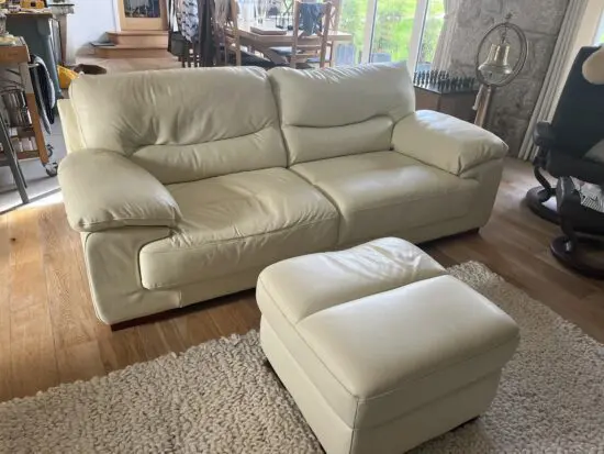 DFS 3 and 1.5 Leather Sofa and matching Chair plus footstool. In Ivory/Cream