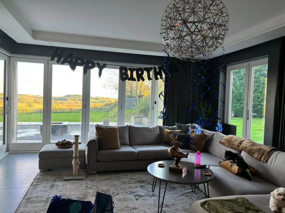Extra large grey corner sofa with footstool and storage