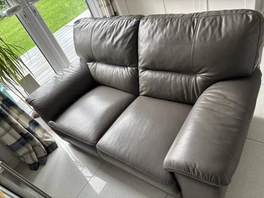 Furniture Village Grey Real Leather two Seat Sofa