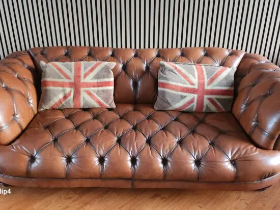 DFS Brown leather Chesterfield style.