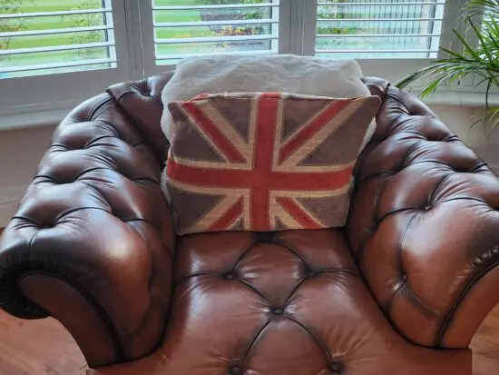 DFS Brown leather Chesterfield style.
