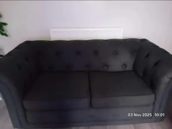 DFS grey Chesterfield style sofas