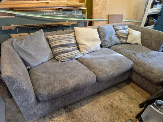 Grey L shape sofa with storage futon