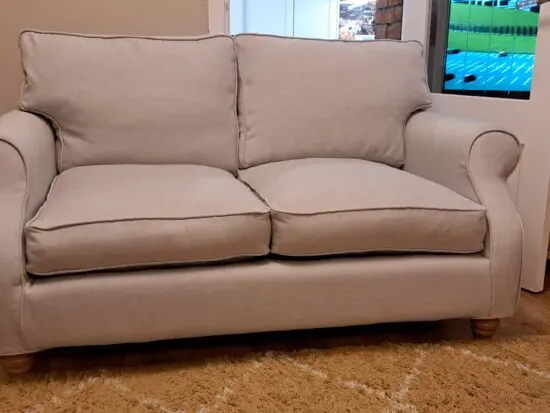 2 x 2 seater silver grey sofas. Removable plump covers. Able to wash in washing machine. In excellent condition. 2 identical sofas