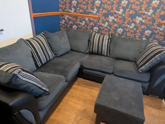 Grey and Black Corner Sofa with Matching Storage Ottoman/Footstool and Circular Swivel Chair