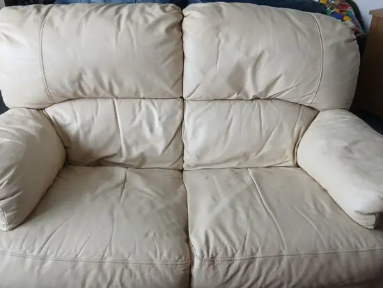 Cream 2 seater sofa