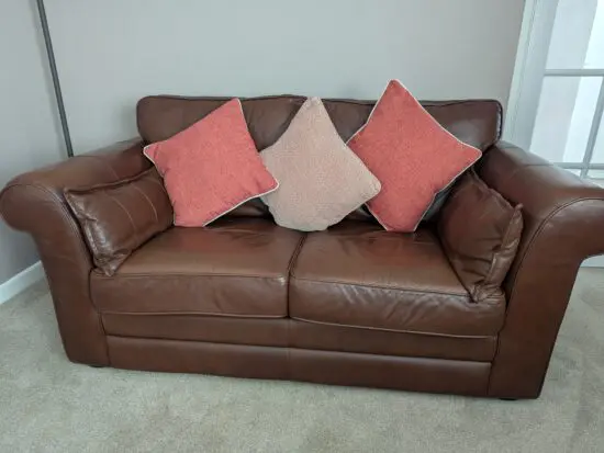 Brown leather 2 seater sofa