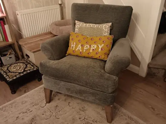 Furniture Village - Lounge Brand - high back chair in a green/grey