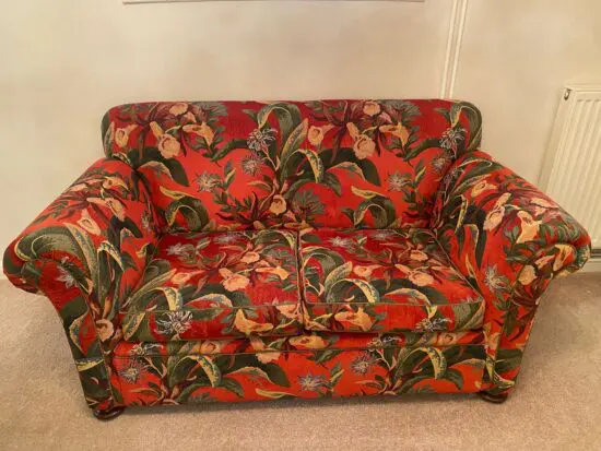 Red bohemian floral pattern sofa
