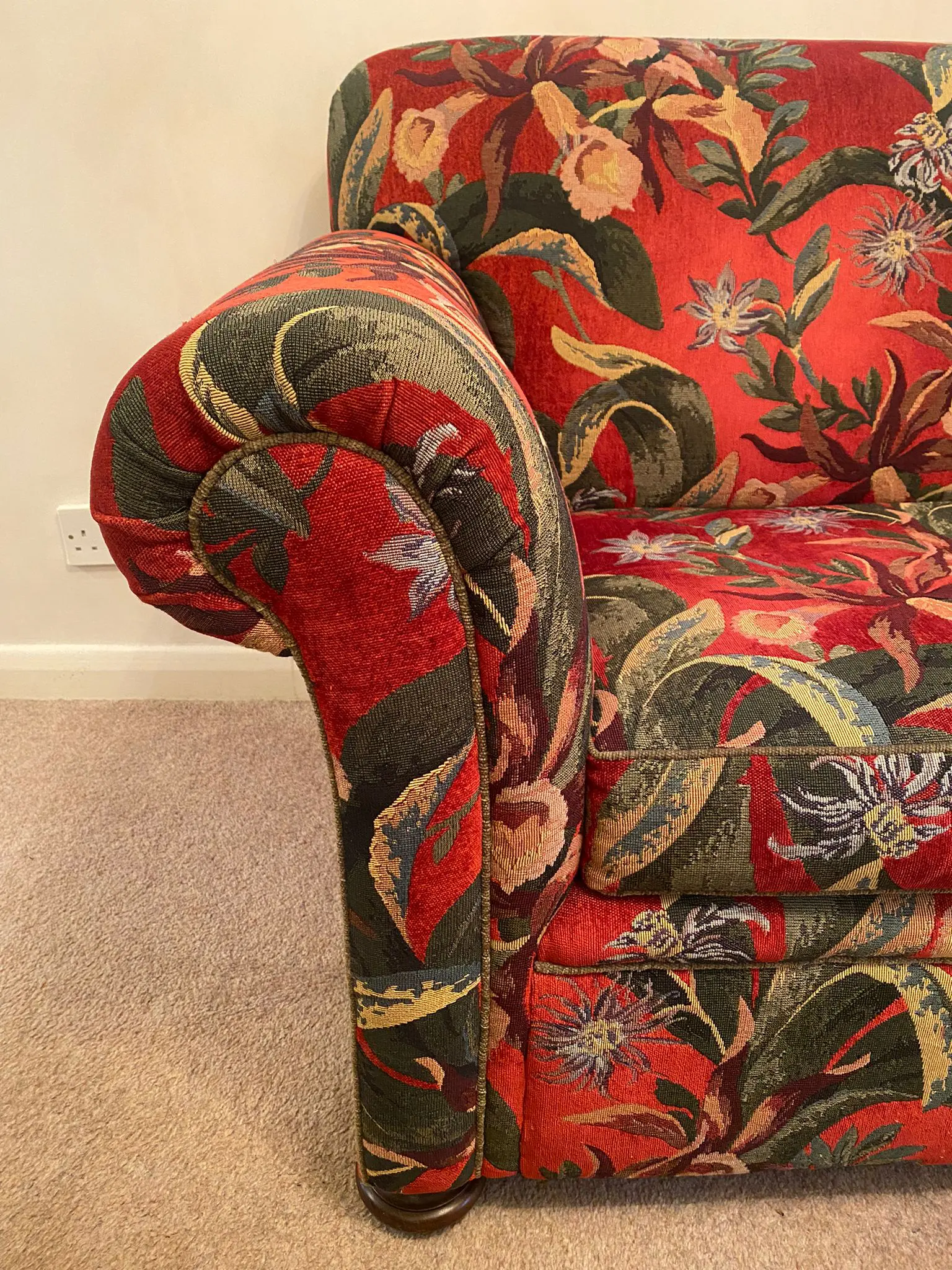Red bohemian floral pattern sofa