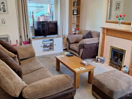 SCS 3 piece suite in brown suede with a leather trim and matching footstool