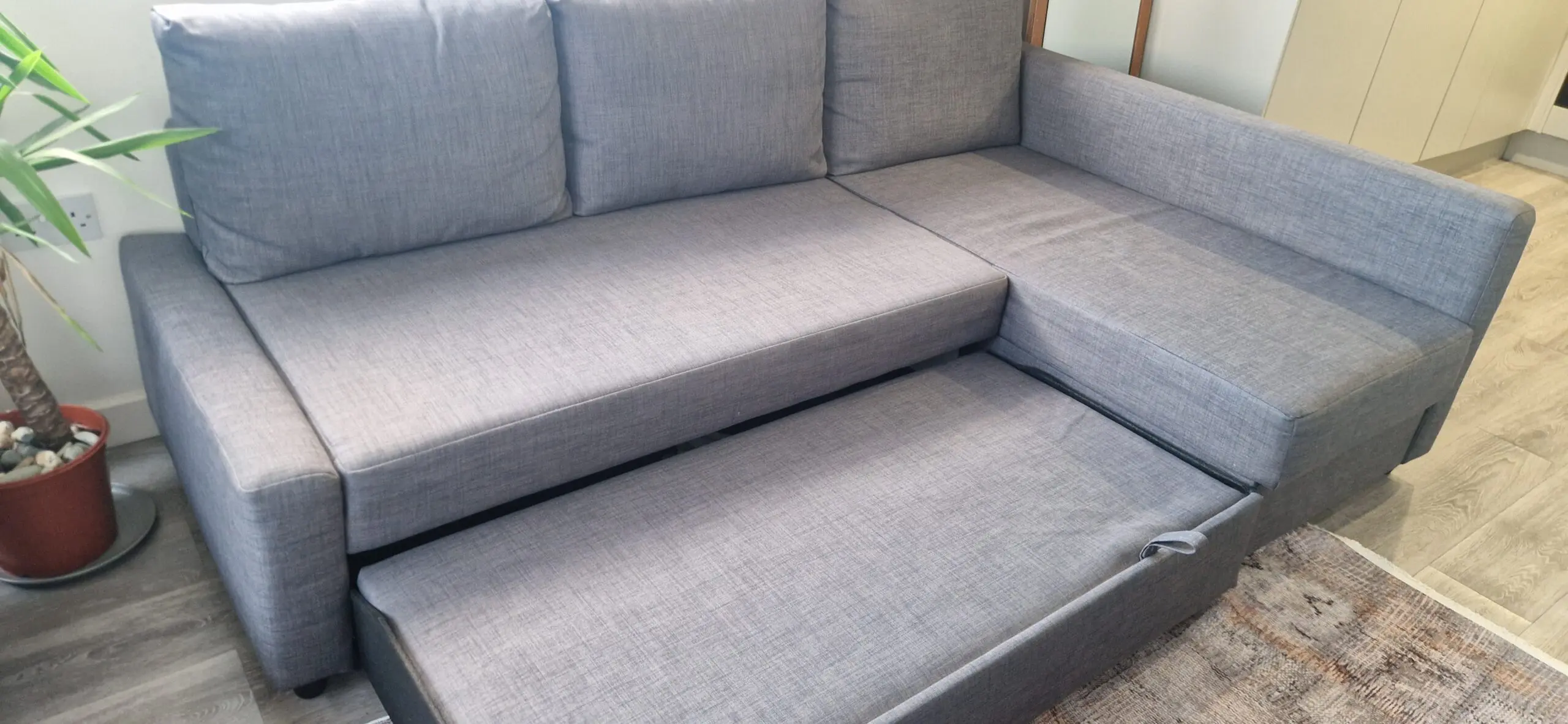 FRIHETEN Corner sofa-bed with storage, Skiftebo dark grey