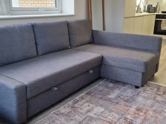 FRIHETEN Corner sofa-bed with storage, Skiftebo dark grey