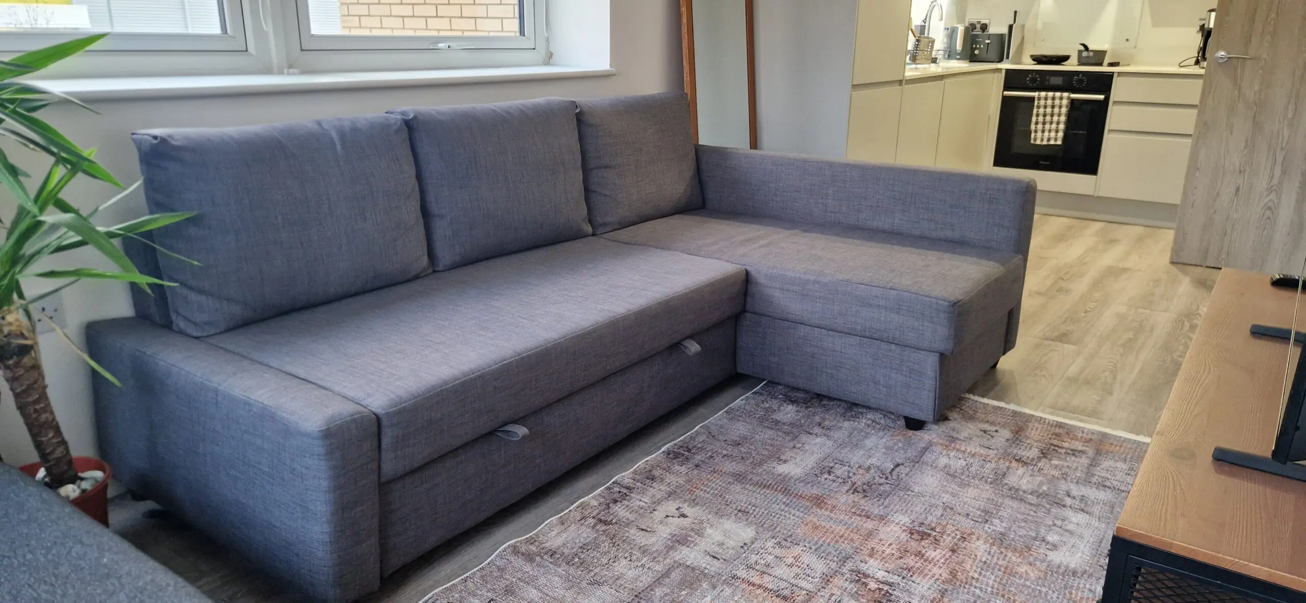 FRIHETEN Corner sofa-bed with storage, Skiftebo dark grey