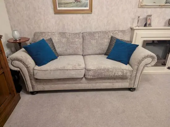 Silver grey 3 seater sofa and armchair.