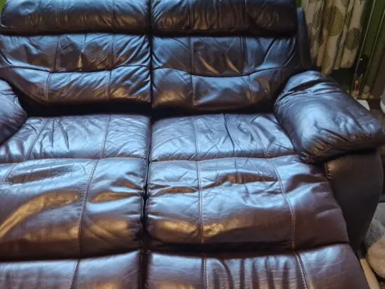 Furniture village 2 seater brown electric recliner sofa