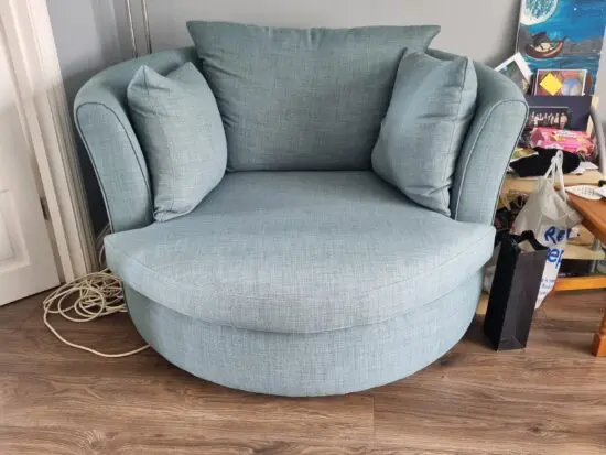 DFS large Swivel chair in 'sky' Blue