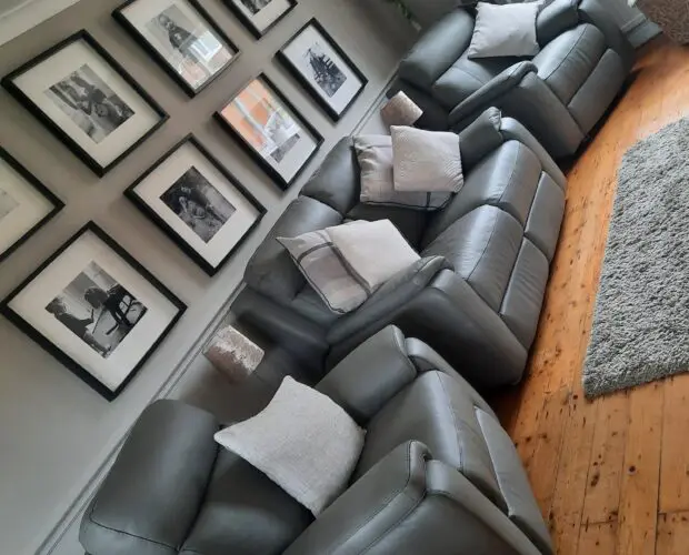 Poltronesofa grey Italian leather two seater sofa and two power recliner chairs
