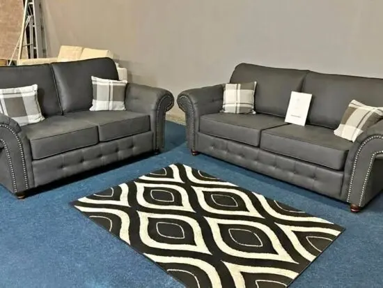 DFS Black Oakland 2 seater sofa and 3 seater leather sofa
