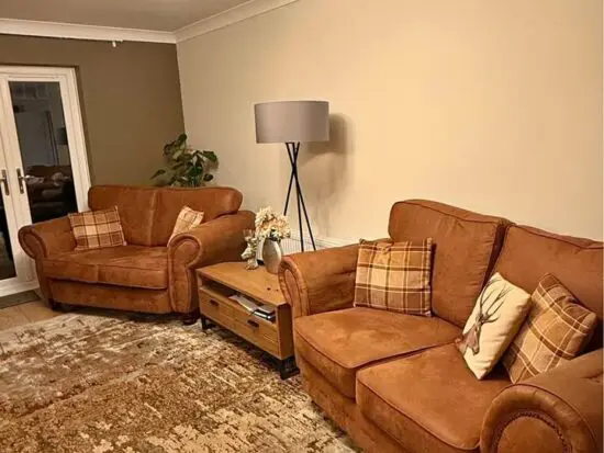 DFS 2x seater leather sofa and 3x seater leather sofa in brown color