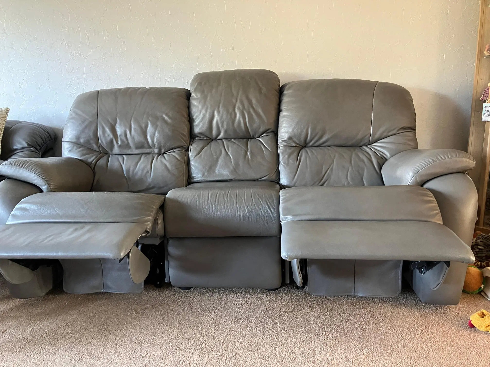 G-Plan light grey leather power reclining sofa and chair, with matching non-reclining sofa and storage footstool