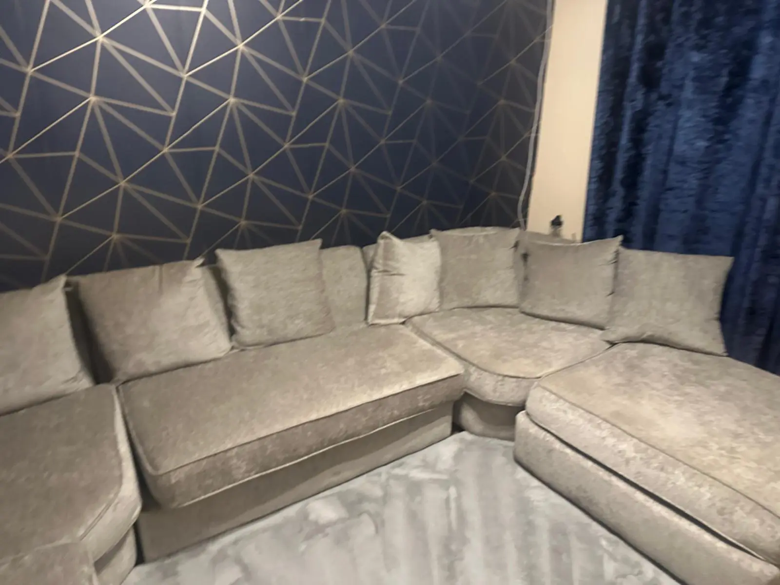grey corner sofa in good shape