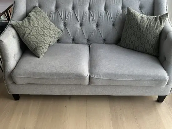 Two seater grey sofa