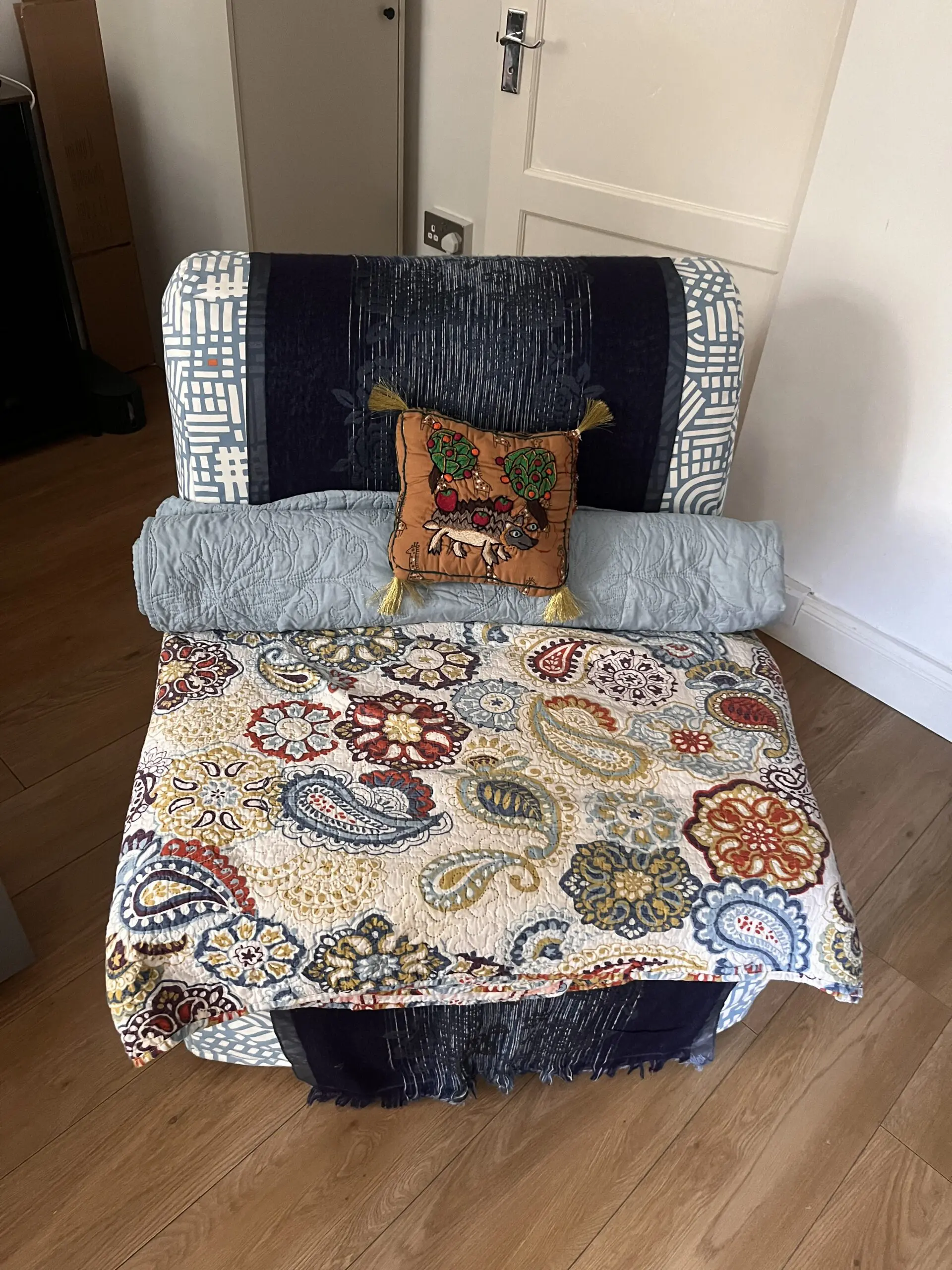 Blue-white IKEA chair bed