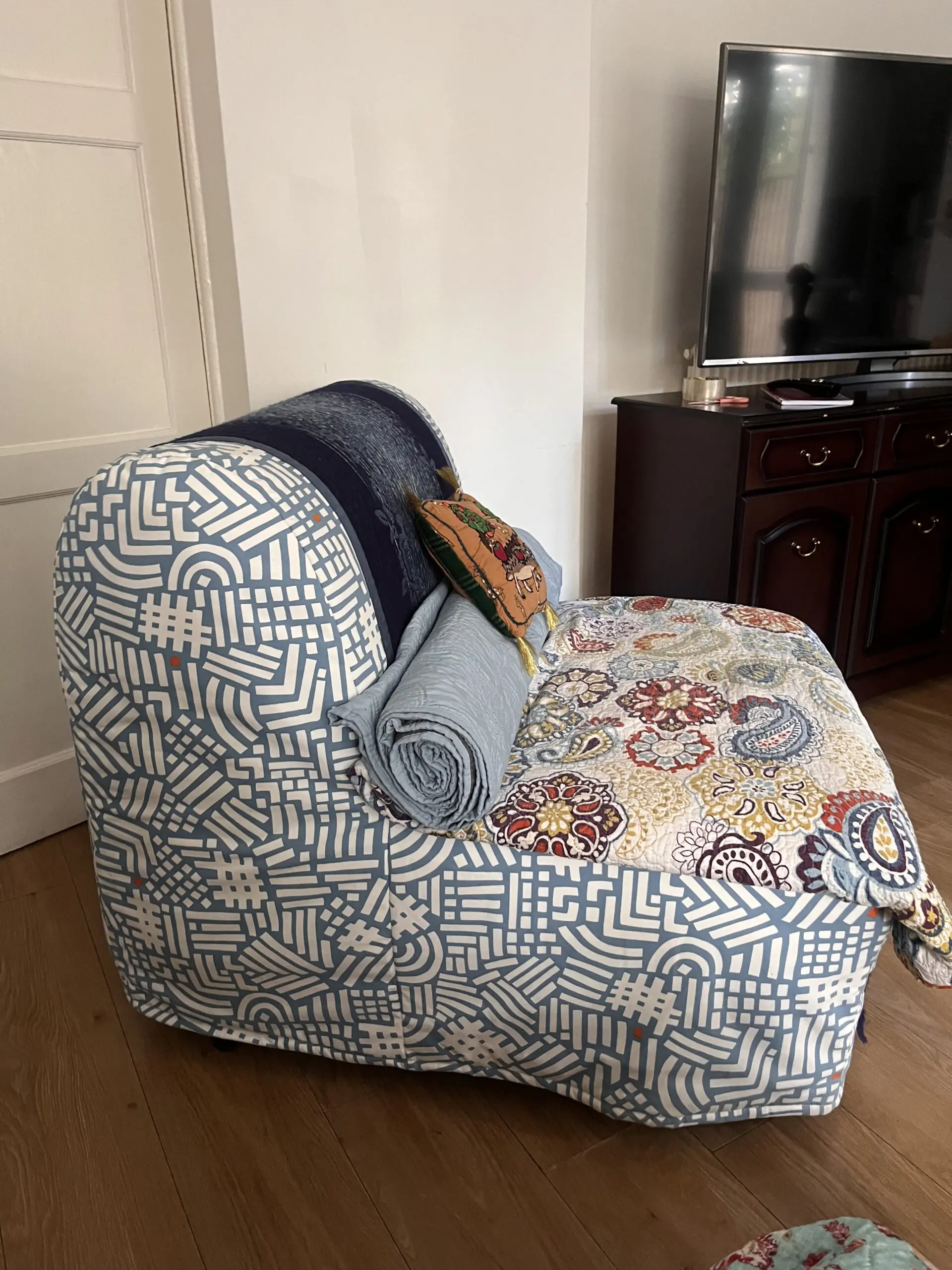 Blue-white IKEA chair bed