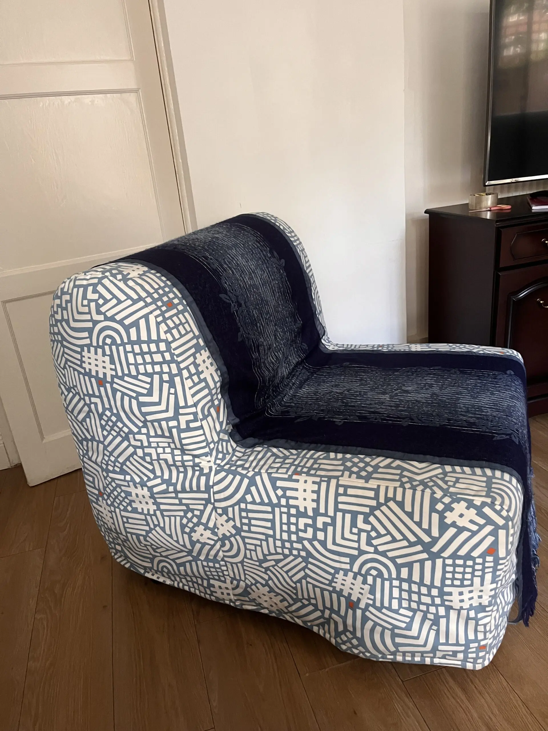 Blue-white IKEA chair bed
