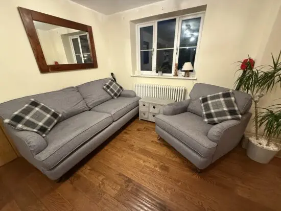 Excellent grey three seater sofa and chair