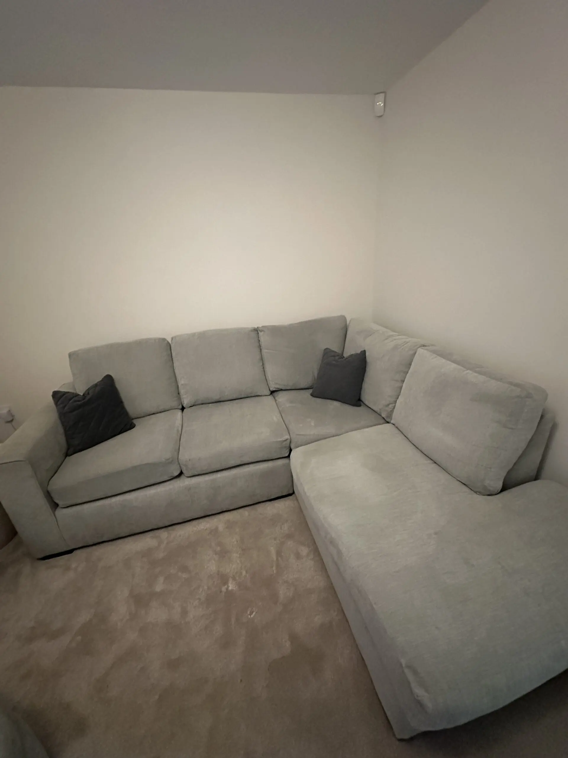 Grey L corner sofa with swivel chair and foot stall