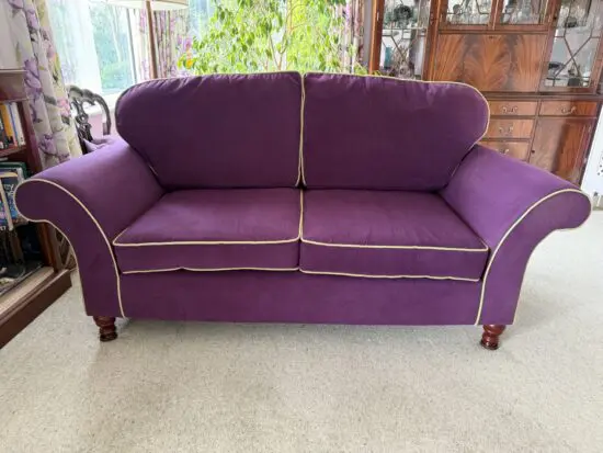 Bespoke Dorchester 2.5 sofa by Sofa Smith Hampshire in Amethyst velvet with citrus contrast trim