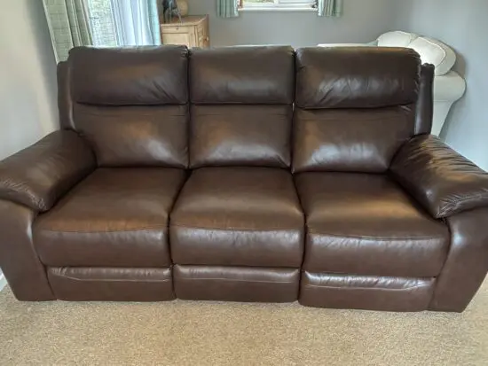 Two 3 seater leather recliner sofas