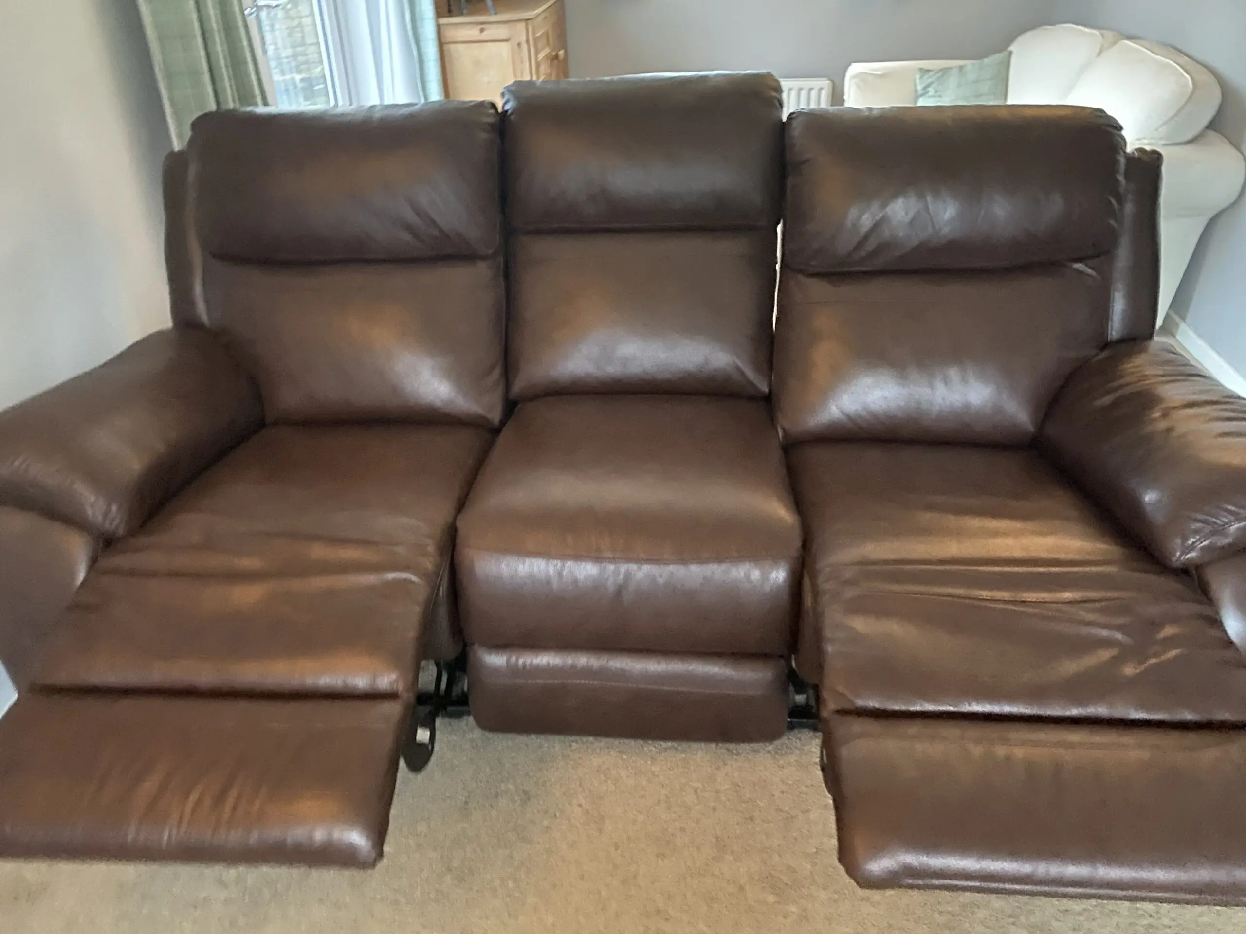 Two 3 seater leather recliner sofas