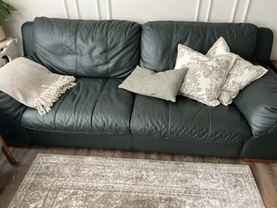 Forest green leather sofa