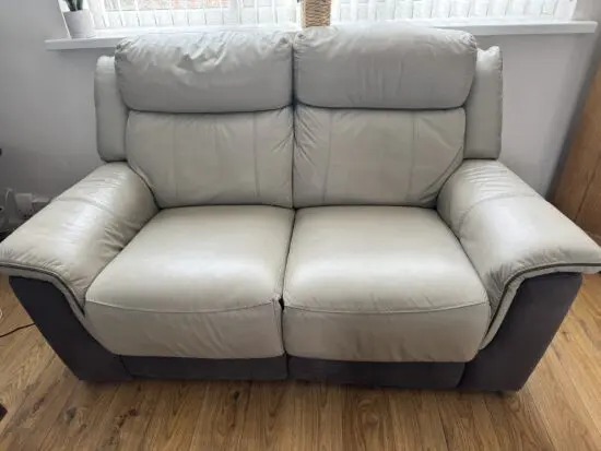 Two 2 Seater DFS Grey Leather Sofa with electric leg support