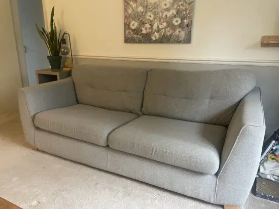 DFS grey four seater sofa