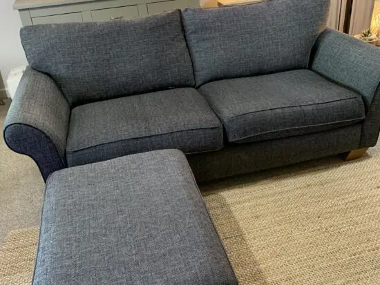 house of fraser 2 and half seater gray sofa and matching footstool.