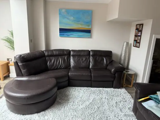 Natuzzi brown leather corner sofa and chair