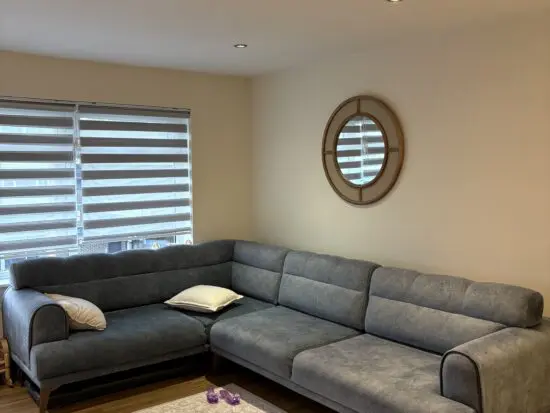 Large blue left hand facing L shape sofa