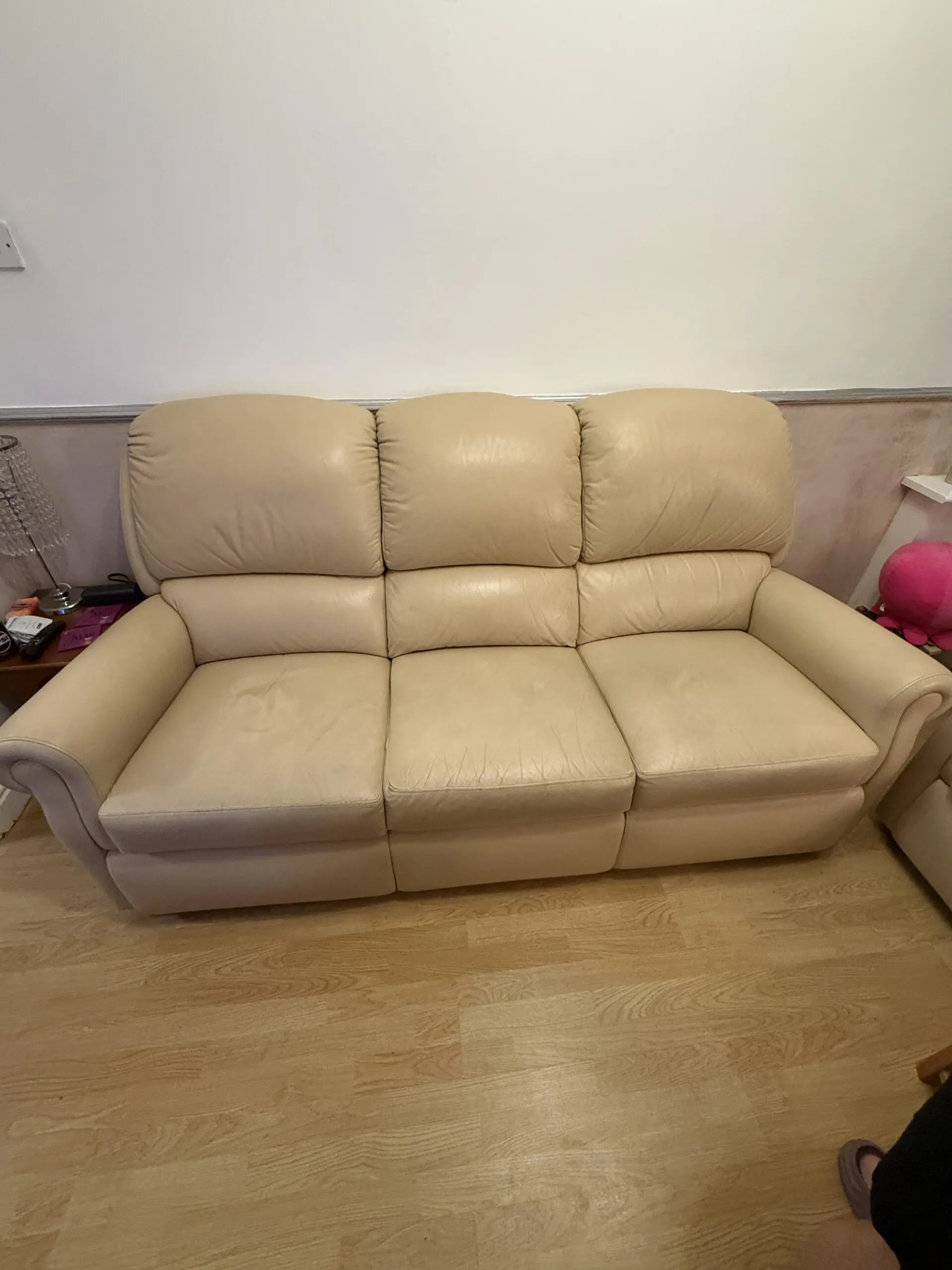 2&3 Beige leather sofas with matching foot stool