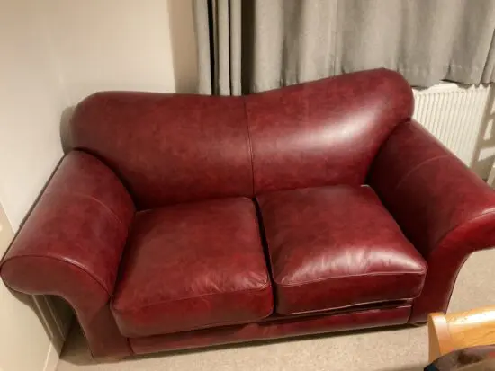 The Chesterfield Company “St David” Curved Back 2 Seater Red Leather Settee