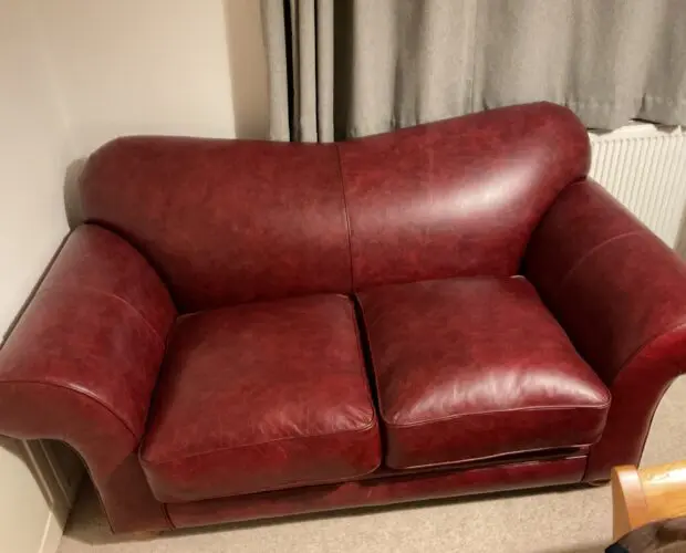 The Chesterfield Company “St David” Curved Back 2 Seater Red Leather Settee