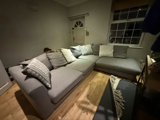 DFS Grey Pillow Back Large Open End Corner Sofa