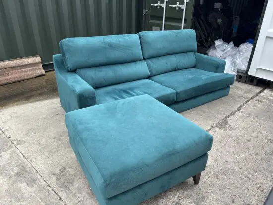 Furniture village sofa made by the lounge company in dragon eye green colour. Excellent condition. Comes with footstool