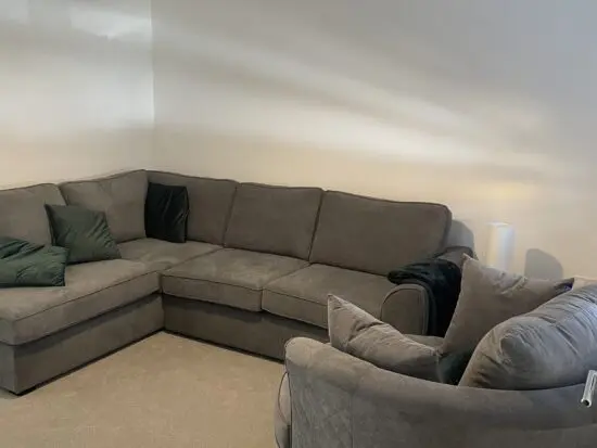 DFS ORKA right hand sofa (4 seater) and large swivel chair in GRAPHITE GREY