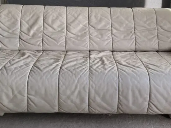 3 seater sofa bed in cream/ivory leather