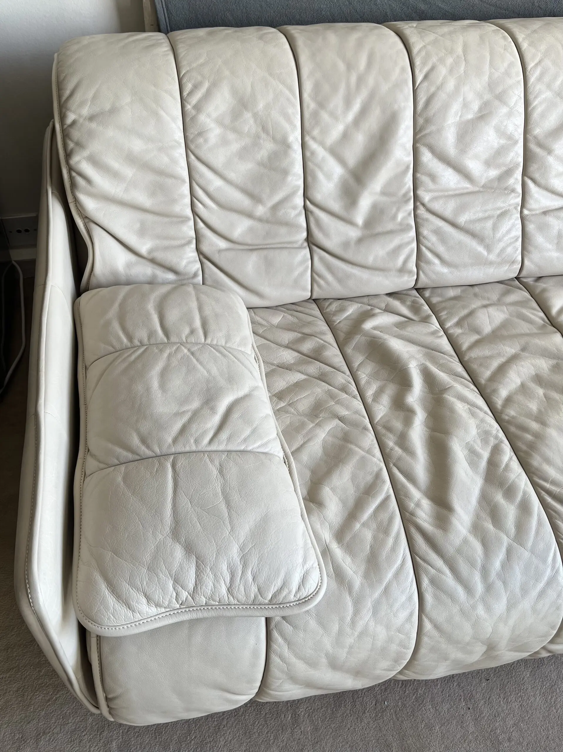 3 seater sofa bed in cream/ivory leather