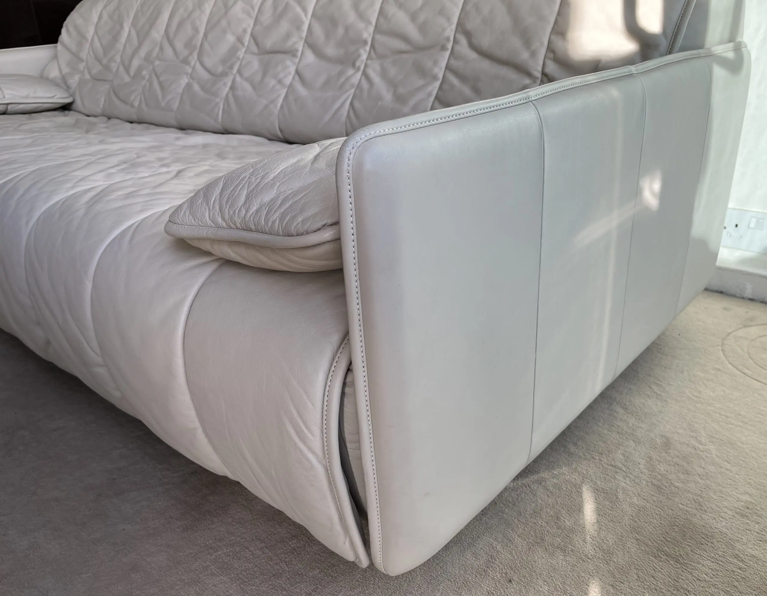 3 seater sofa bed in cream/ivory leather